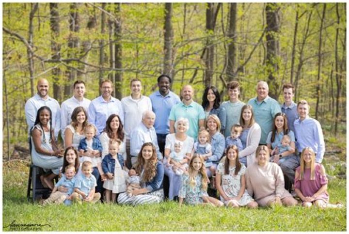 A Family Portrait Of Their Kids